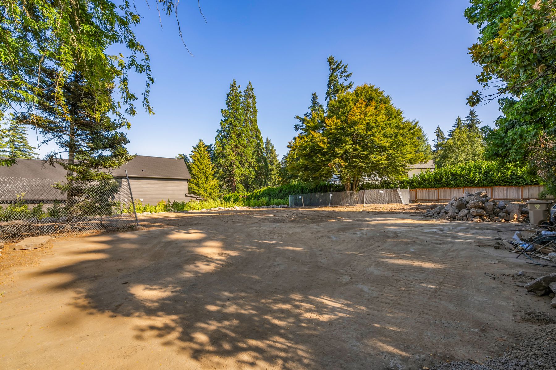 The pad with neighboring homes beyond
